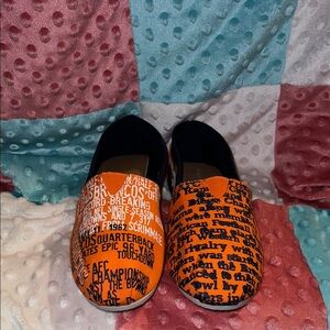Women Orange Printed Slip-On Shoes
